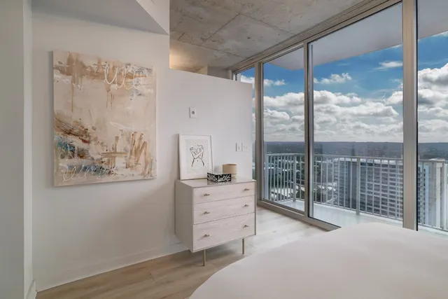 a view of a hallway with a dresser