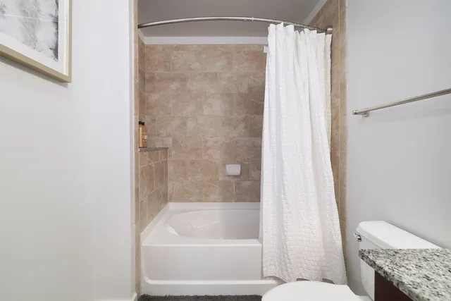 a view of a city with tall buildings