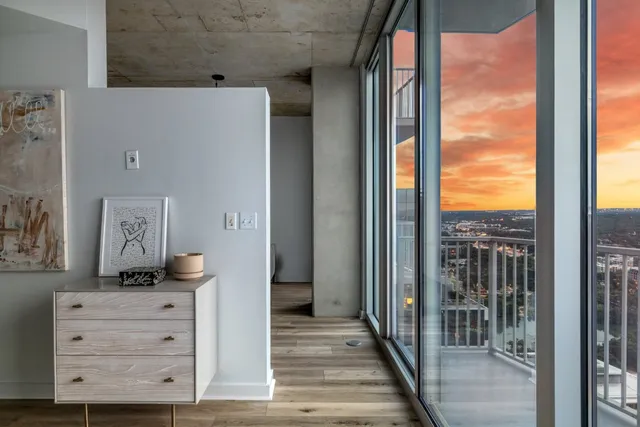 a view of a balcony with city view
