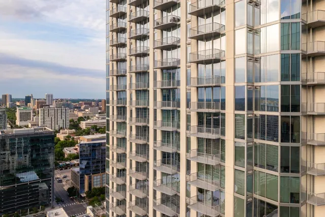 a front view of a building with multiple windows