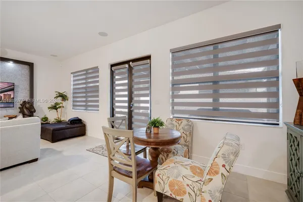 a view of a hallway with a white walls