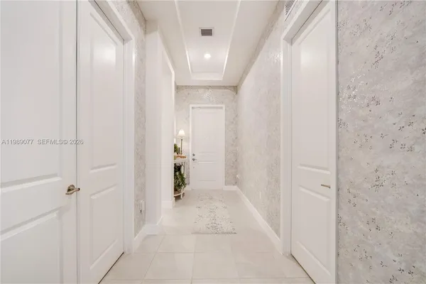 a view of a dining room with furniture and window