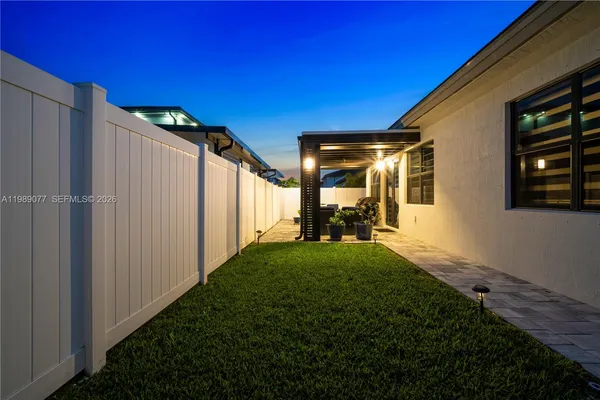 a view of back yard of the house