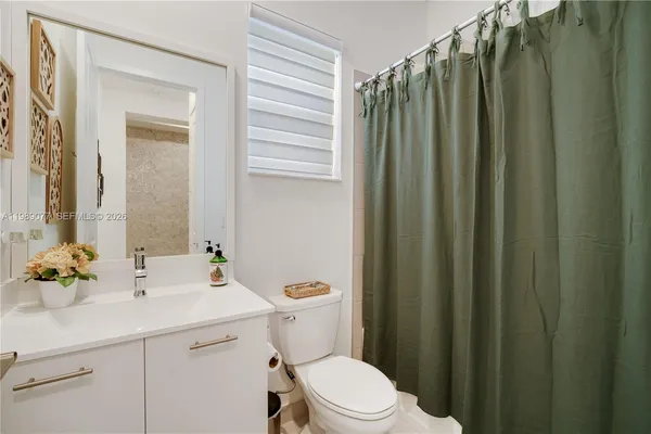 a workspace with furniture and a window