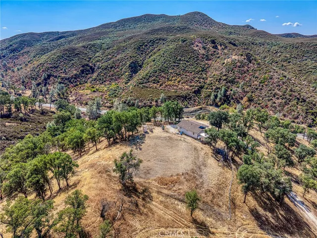 a view of a city with mountains in the background