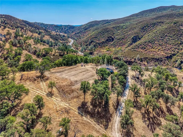 a view of a large building with a mountain in the background