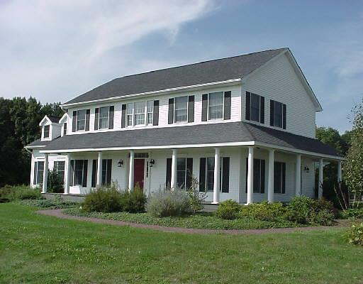 32 Highmeadow Lane Roxbury, CT 06783 - Photo 1 of 1 a front view of a house with a yard