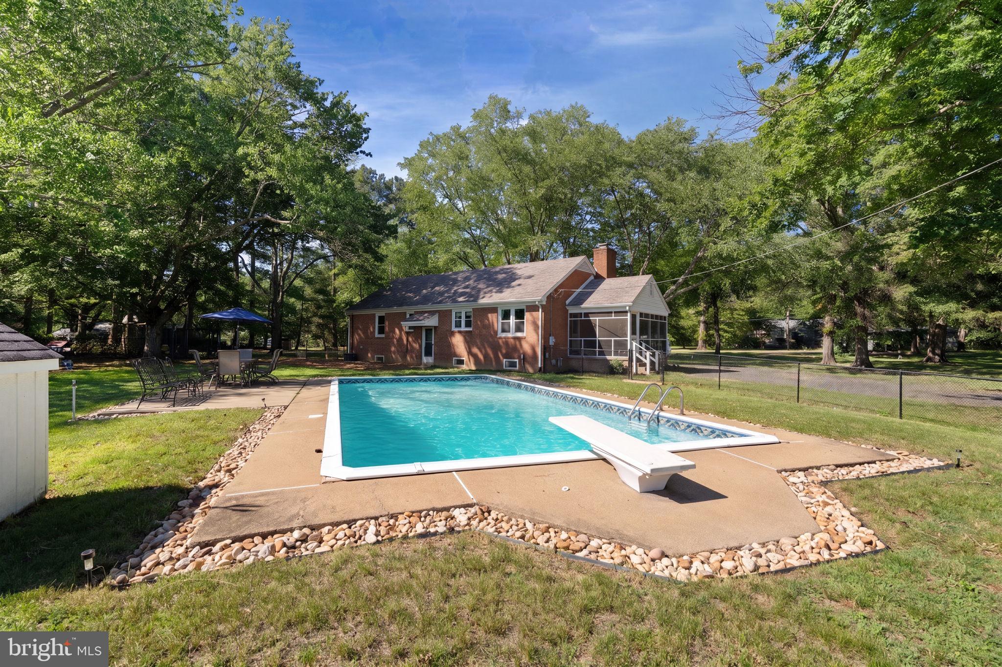 4921 Dumfries Road Catlett, VA 20119 - Photo 18 of 25 Sparkling In-Ground Pool.