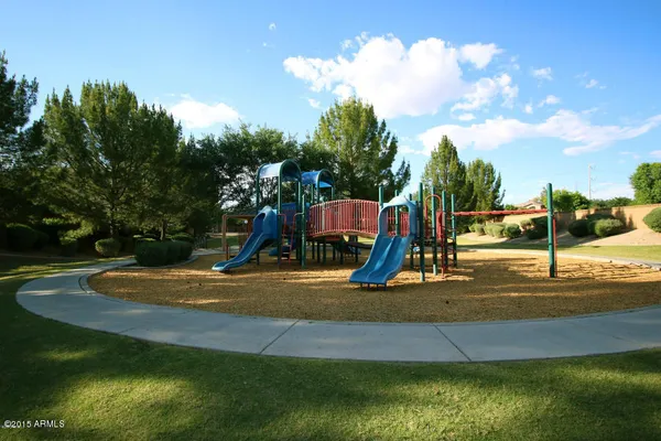 a view of a park with swings
