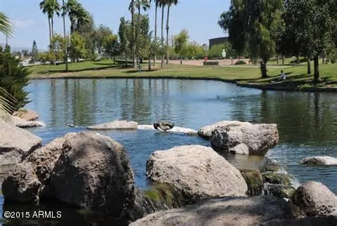 a view of a lake with outdoor space