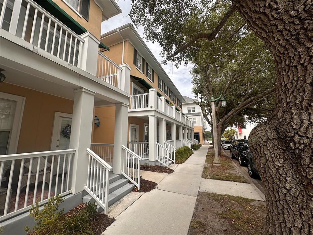 709 Bloom Street, Unit 240 Celebration, FL 34747 - Photo 1 of 17 a view of a house with a yard