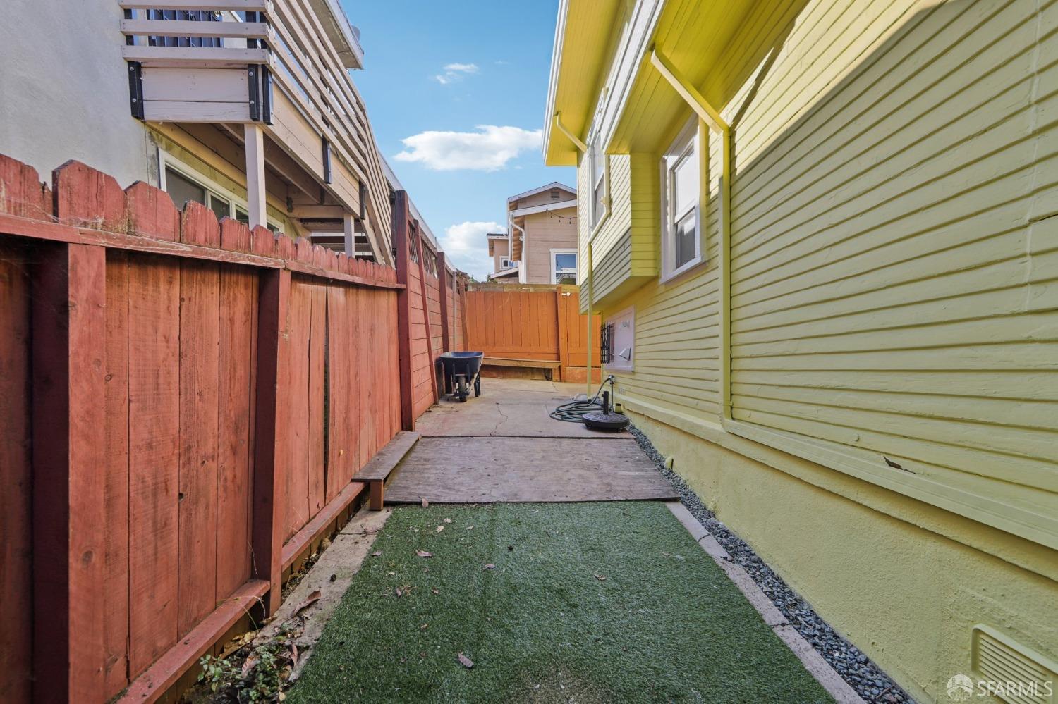 2047 36th Avenue Oakland, CA 94601 - Photo 11 of 19 a path view of a house with a yard