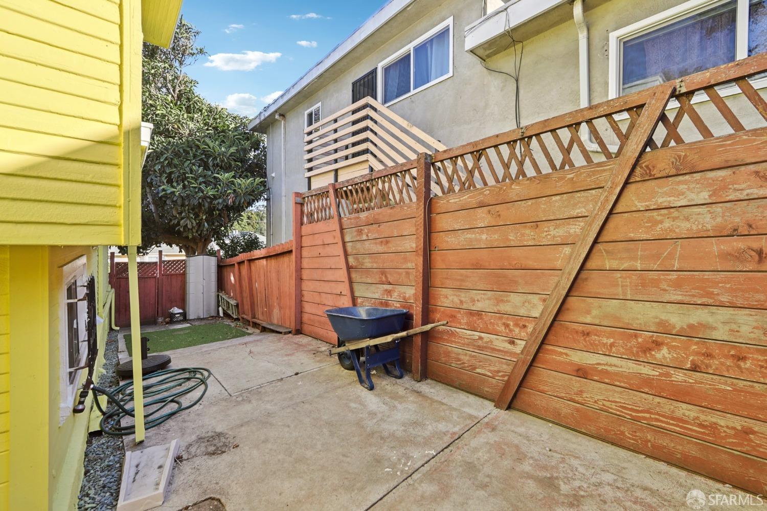 2047 36th Avenue Oakland, CA 94601 - Photo 12 of 19 a view of a pathway with a backyard