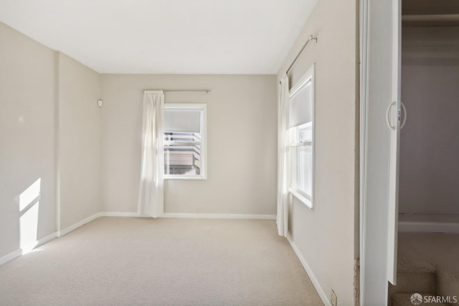 2047 36th Avenue Oakland, CA 94601 - Photo 18 of 19 a view of an empty room with a window