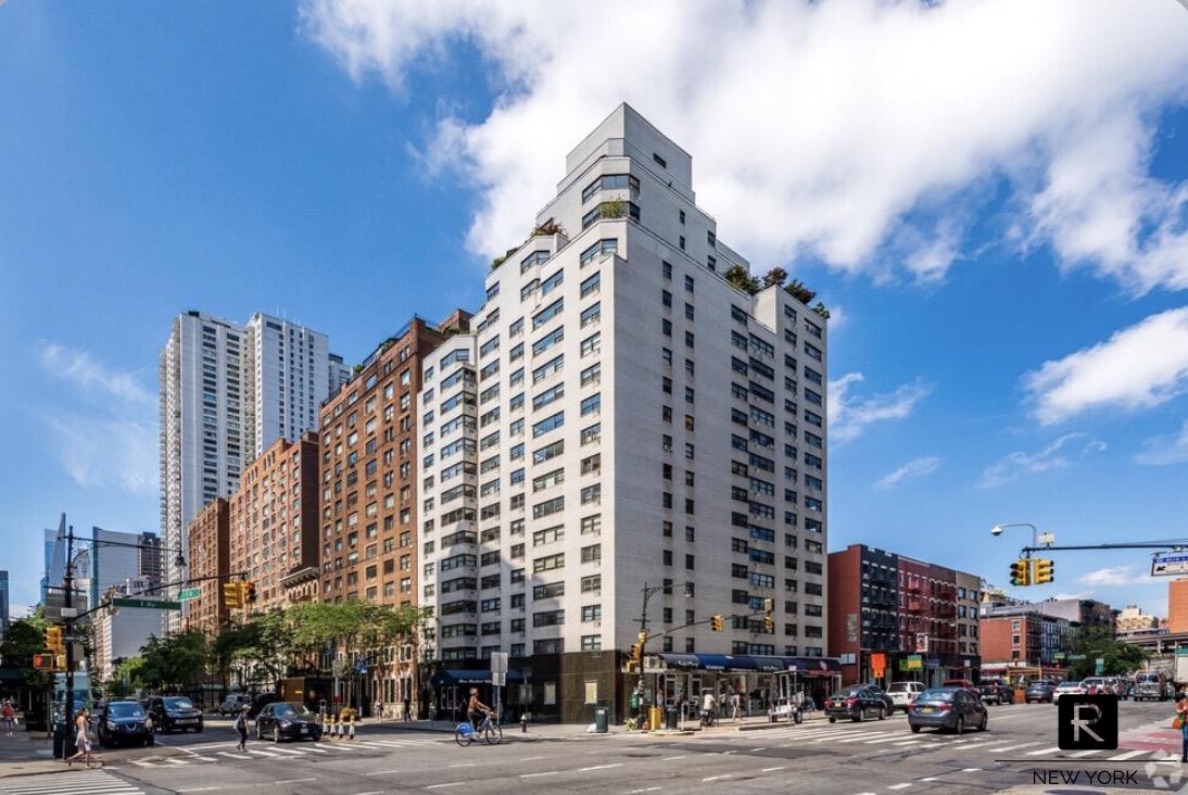 345 East 73rd Street, Unit 3F Manhattan, NY 10021 - Photo 8 of 9 a view of a city with tall buildings