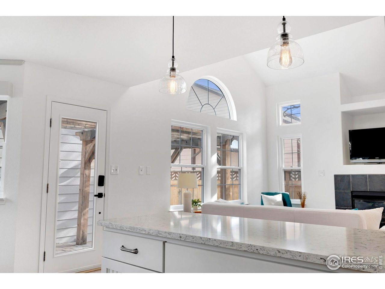 3109 Concord Way Longmont, CO 80503 - Photo 15 of 50 Custom lighting and view to the patio