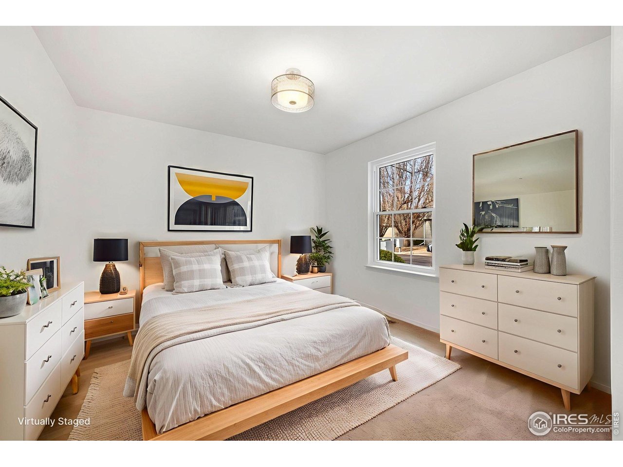 3109 Concord Way Longmont, CO 80503 - Photo 16 of 50 Main level bedroom - virtually staged