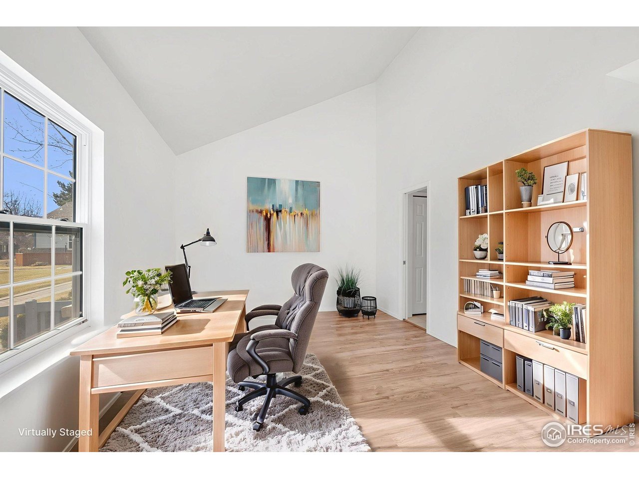 3109 Concord Way Longmont, CO 80503 - Photo 20 of 50 Main level office or craft room is adjacent to a full bathroom. This room is virtually staged