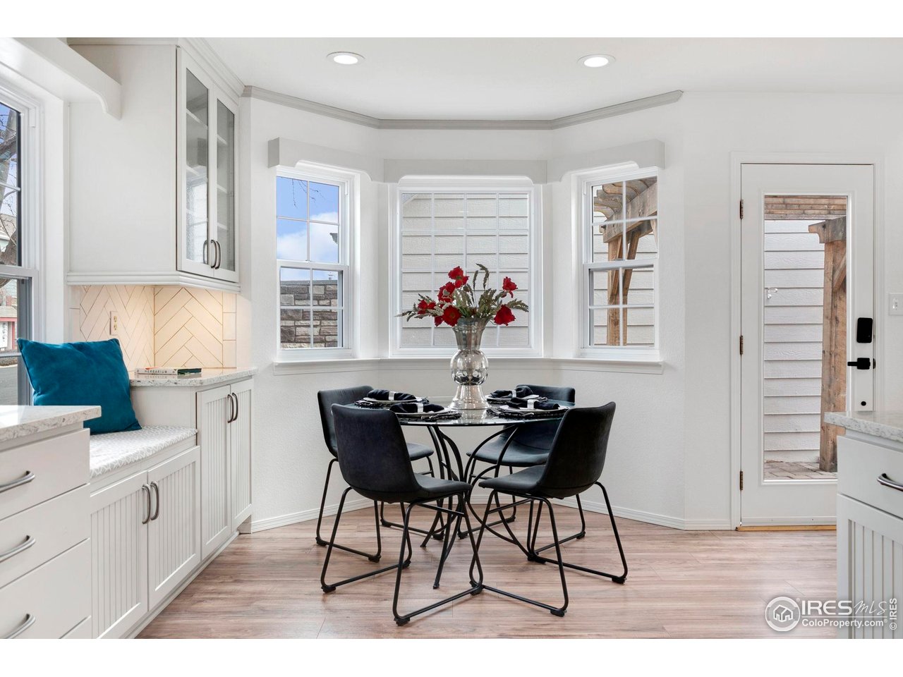 3109 Concord Way Longmont, CO 80503 - Photo 2 of 50 Open dining space previously had a 6-top table and chair set with plenty of room for everyone to gather