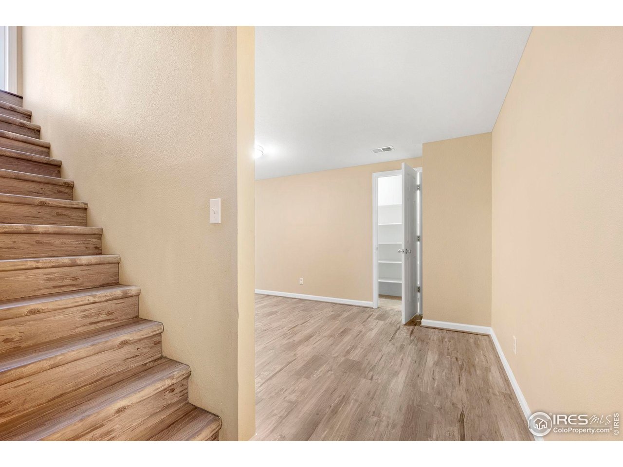 3109 Concord Way Longmont, CO 80503 - Photo 32 of 50 Newer LVP flooring in the basement and stairs