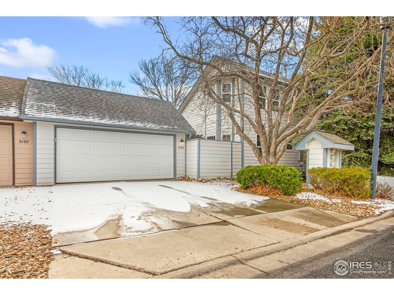 3109 Concord Way Longmont, CO 80503 - Photo 46 of 50 Garage and back of the home from Concord Way