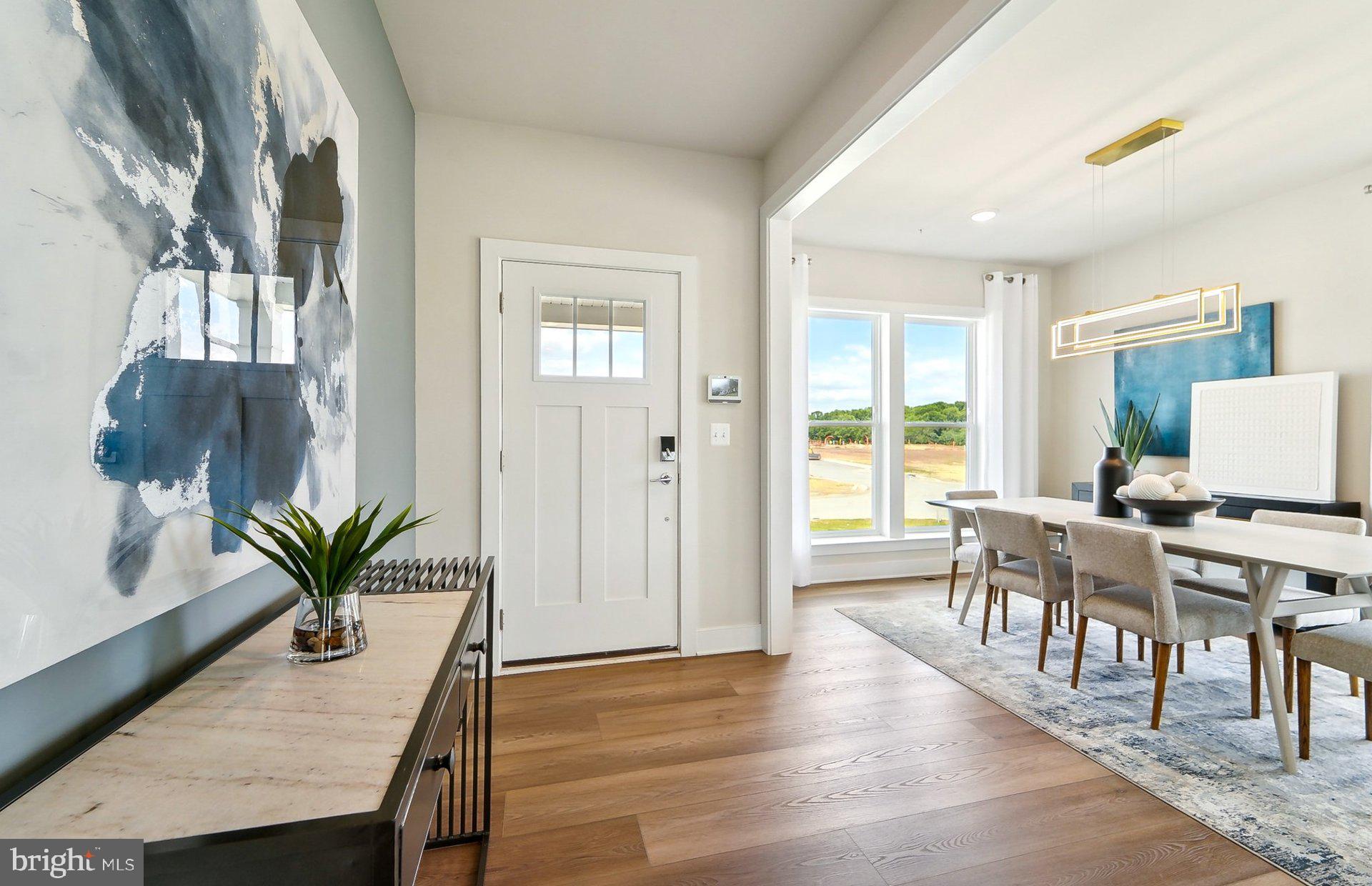 22521 Sculpin Brk Road Boyds, MD 20841 - Photo 2 of 52 a view of a livingroom with furniture and a window