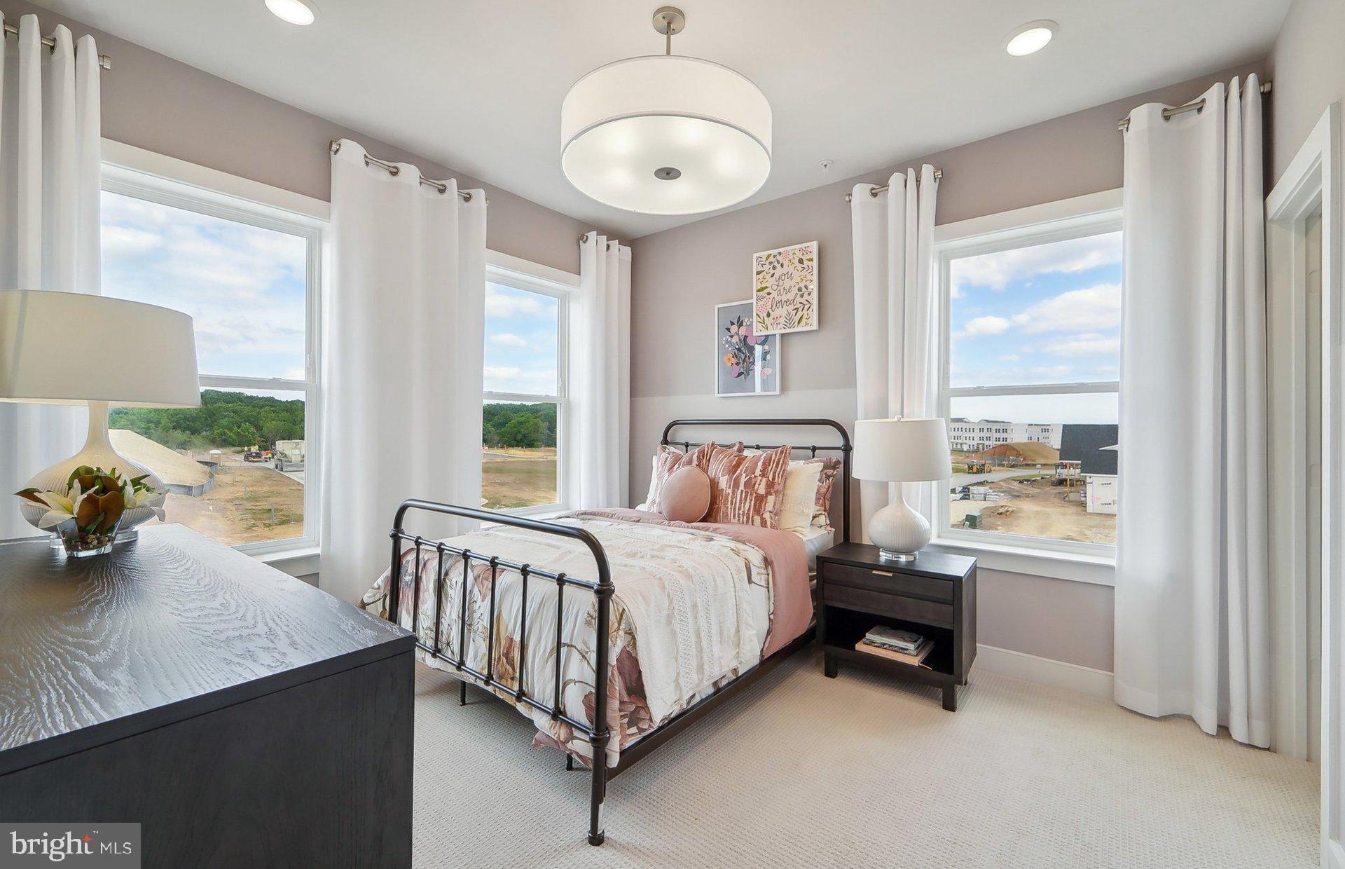 22521 Sculpin Brk Road Boyds, MD 20841 - Photo 26 of 52 a bedroom with a bed and a window
