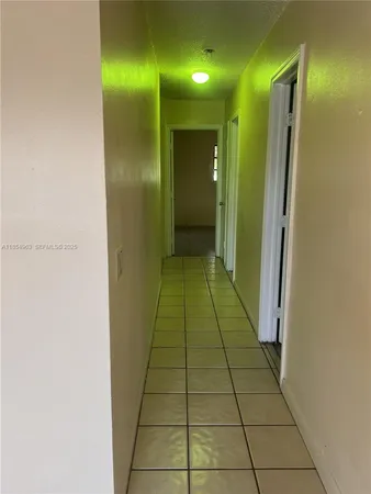 a bathroom with a mirror and a shower