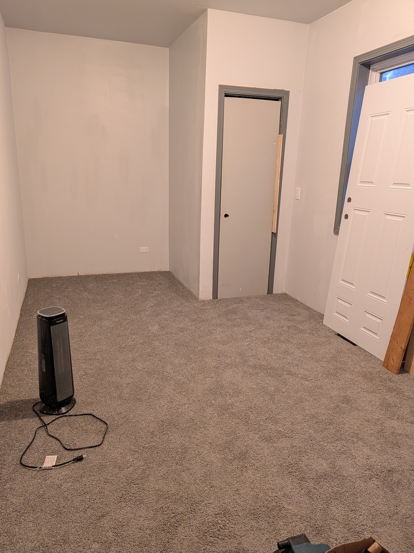 5041 West George Street Chicago, IL 60641 - Photo 8 of 11 a view of a room with gym equipment