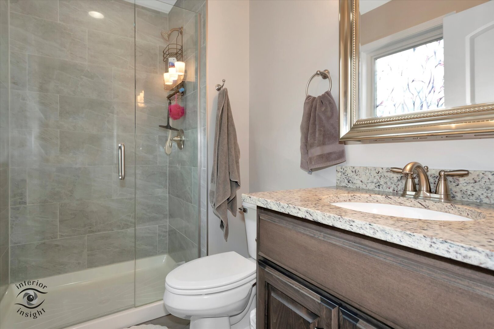 520 Hackberry Road Frankfort, IL 60423 - Photo 14 of 28 a bathroom with a granite countertop sink a toilet and shower