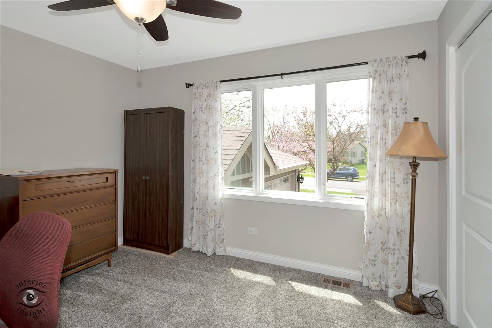 520 Hackberry Road Frankfort, IL 60423 - Photo 15 of 28 an empty room with a window and a ceiling fan