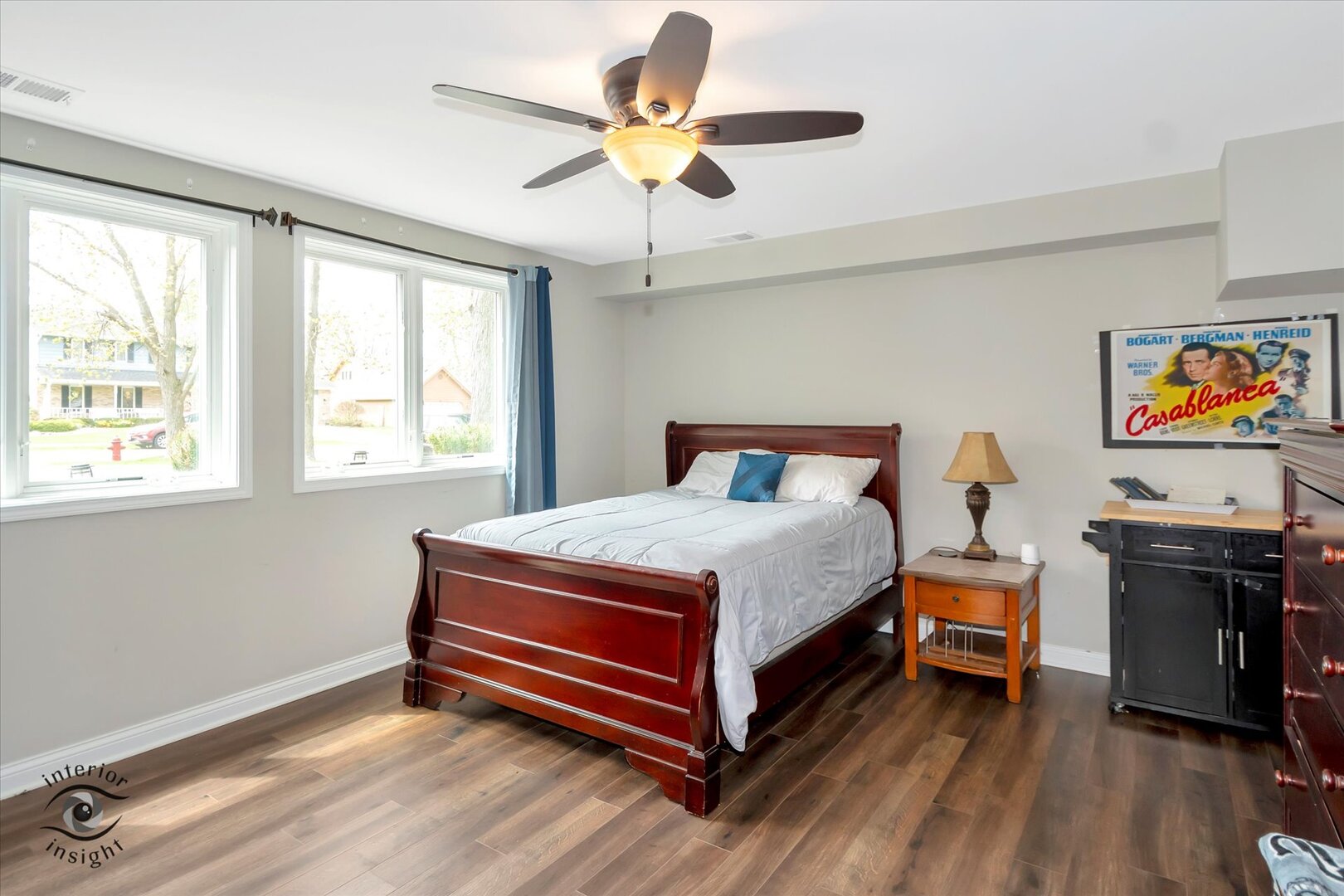 520 Hackberry Road Frankfort, IL 60423 - Photo 21 of 28 a bedroom with a bed and a chandelier