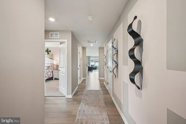 a hallway with a white walls
