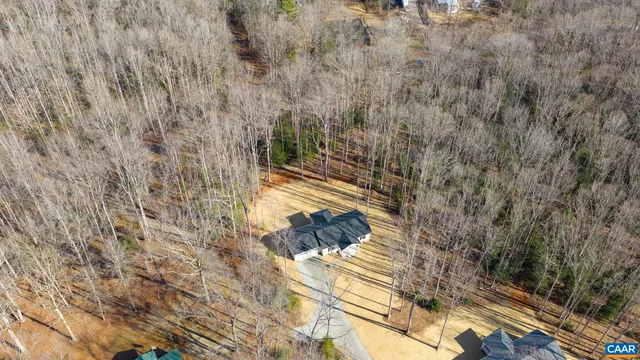 a view of house with yard