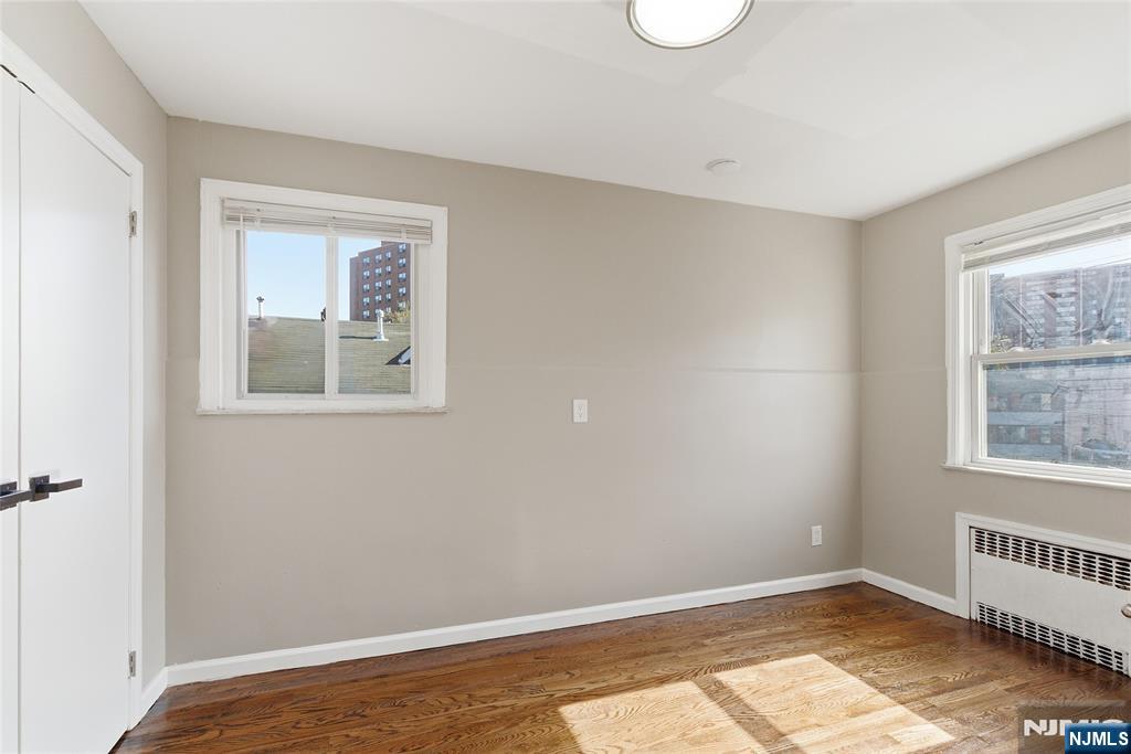 293 North Center Street, Unit 2 Orange, NJ 07050 - Photo 14 of 25 a view of an empty room with a window