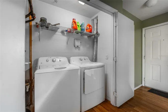 a utility room with dryer and washer