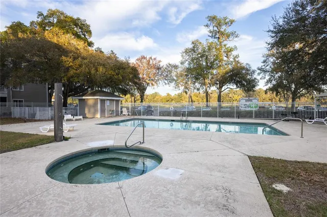 a house view with a backyard space
