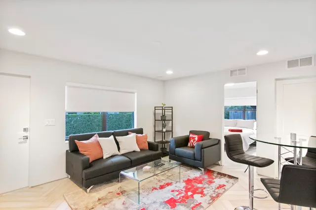 a living room with furniture and a couch