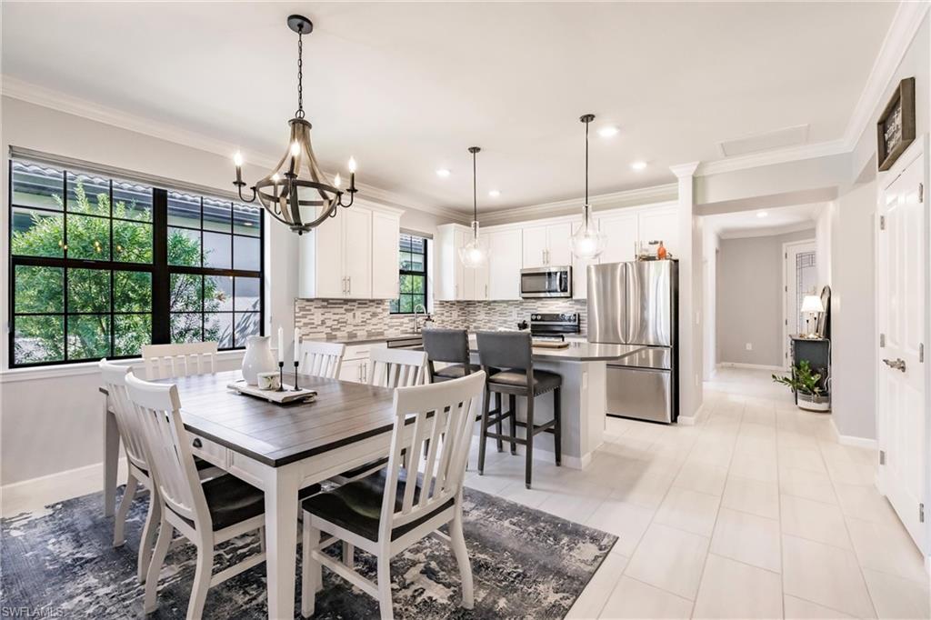 16637 Rolling Rock Boulevard Alva, FL 33920 - Photo 15 of 46 a view of a dining room and livingroom view