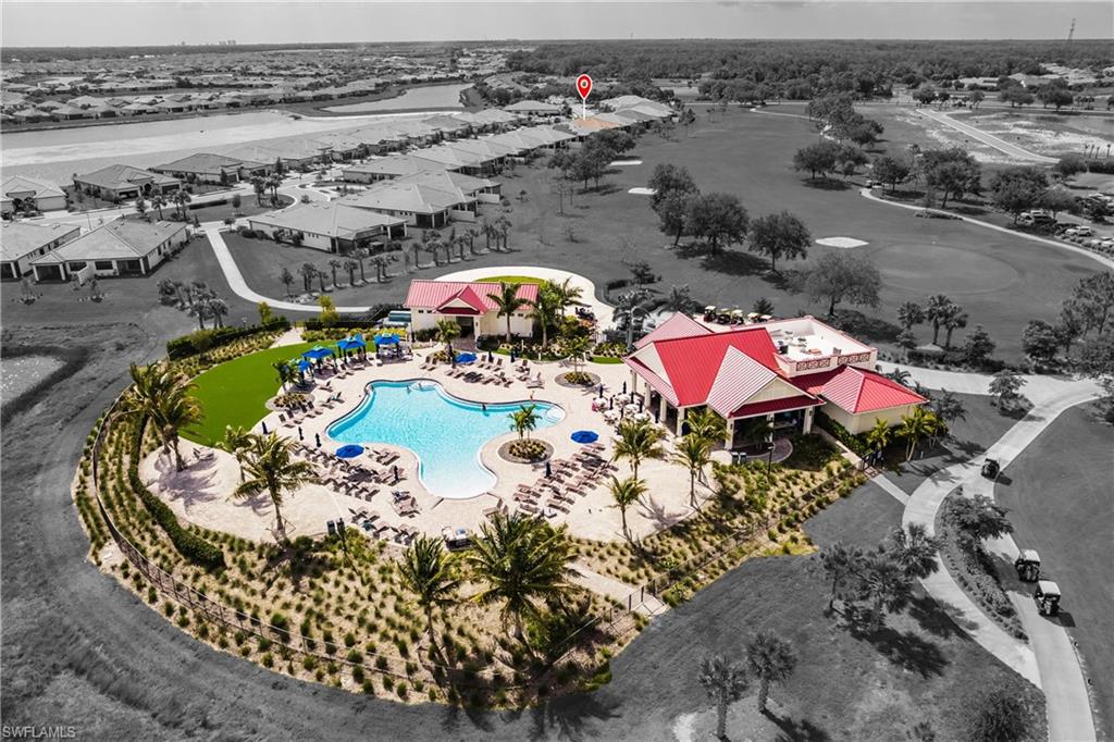 16637 Rolling Rock Boulevard Alva, FL 33920 - Photo 3 of 46 an aerial view of a house with a swimming pool