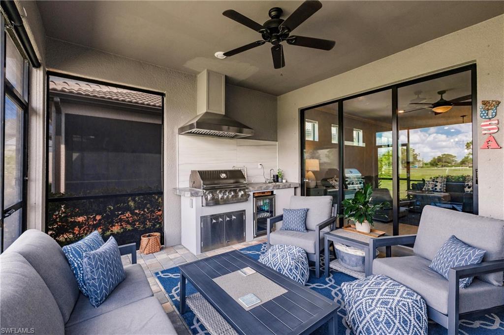 16637 Rolling Rock Boulevard Alva, FL 33920 - Photo 33 of 46 a living room with furniture and a window