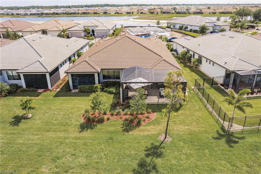 16637 Rolling Rock Boulevard Alva, FL 33920 - Photo 36 of 46 an aerial view of multiple house