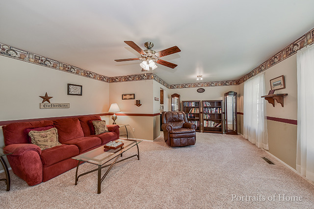 16 Pembrooke Road Montgomery, IL 60538 - Photo 2 of 16 a living room with furniture and ceiling fan