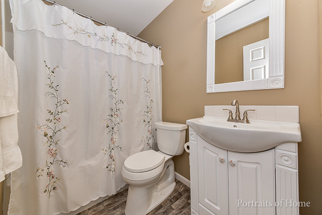 16 Pembrooke Road Montgomery, IL 60538 - Photo 13 of 16 a bathroom with a sink toilet and shower