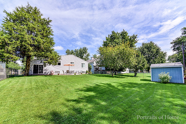 16 Pembrooke Road Montgomery, IL 60538 - Photo 16 of 16 a front view of a house with garden