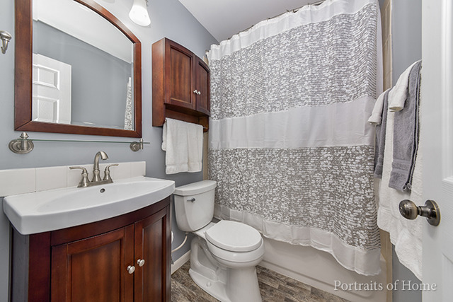16 Pembrooke Road Montgomery, IL 60538 - Photo 10 of 16 a bathroom with a sink toilet and shower