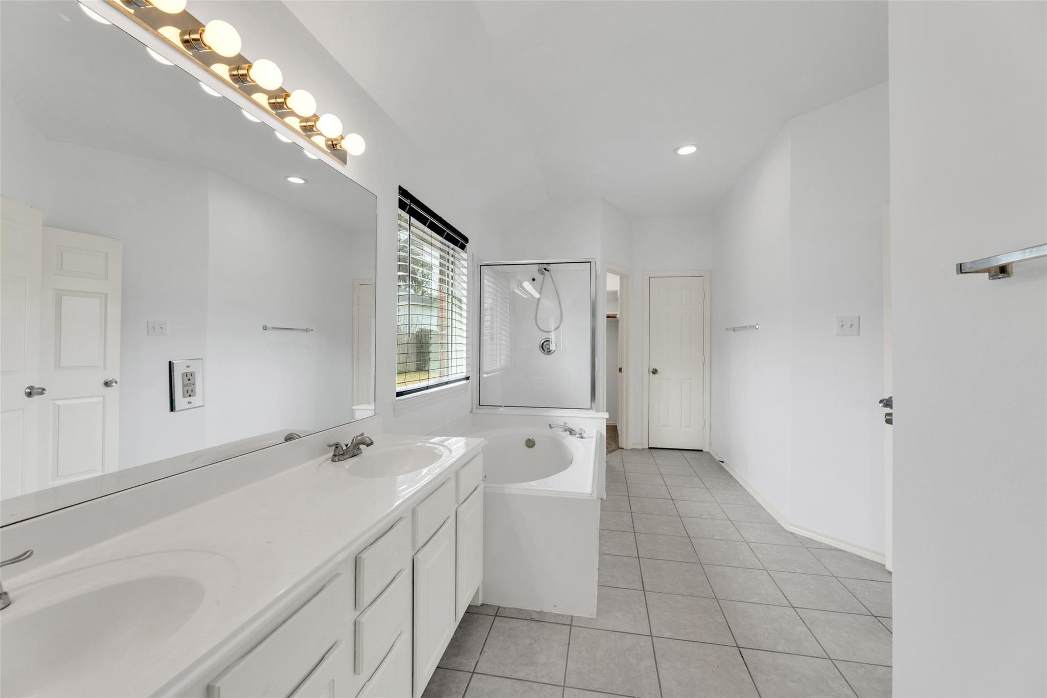 24523 Rathford Court Katy, TX 77494 - Photo 19 of 33 Primary bath features dual sinks.