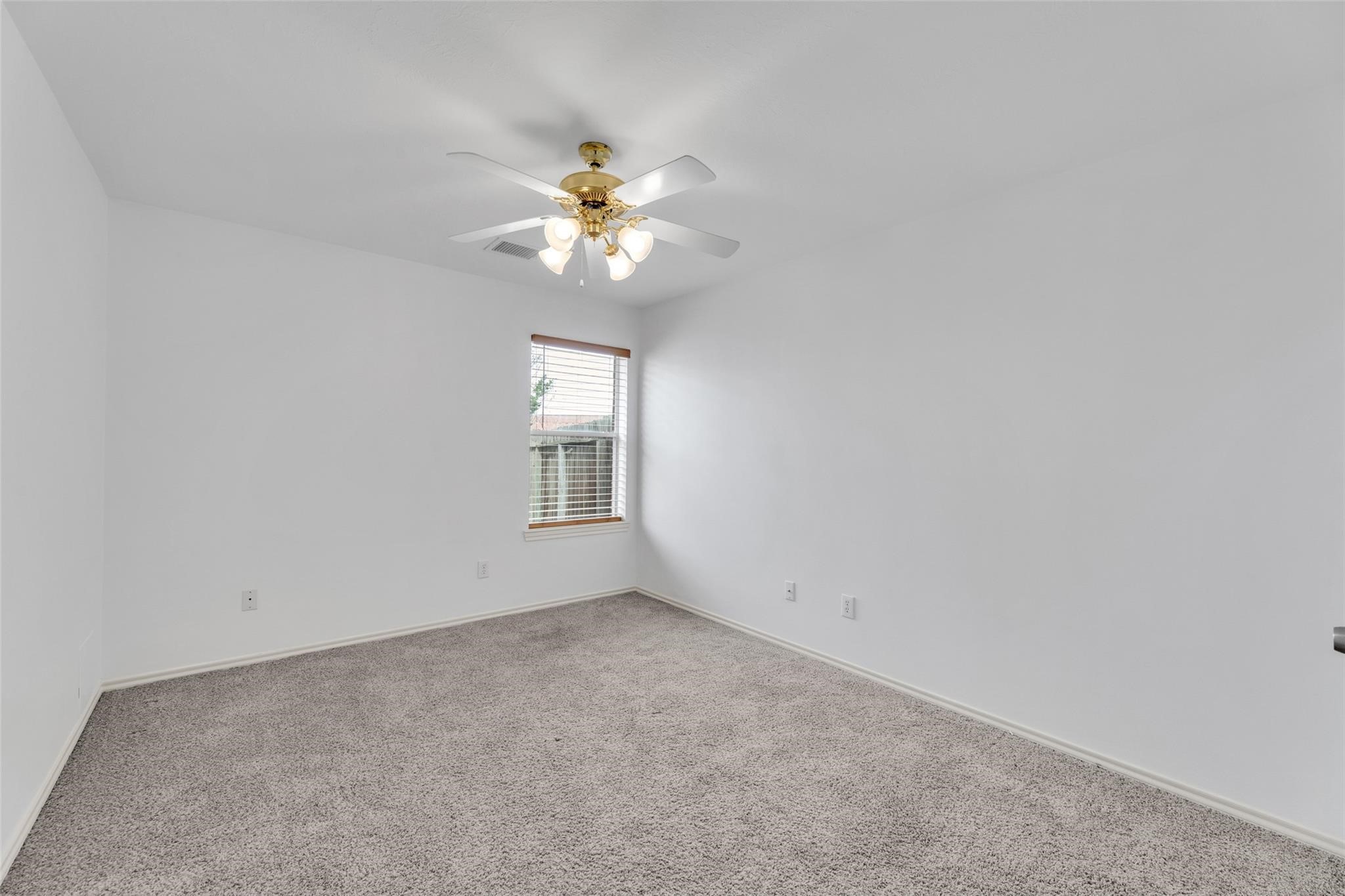 24523 Rathford Court Katy, TX 77494 - Photo 23 of 33 Cozy secondary bedroom with room for personalized furnishings.