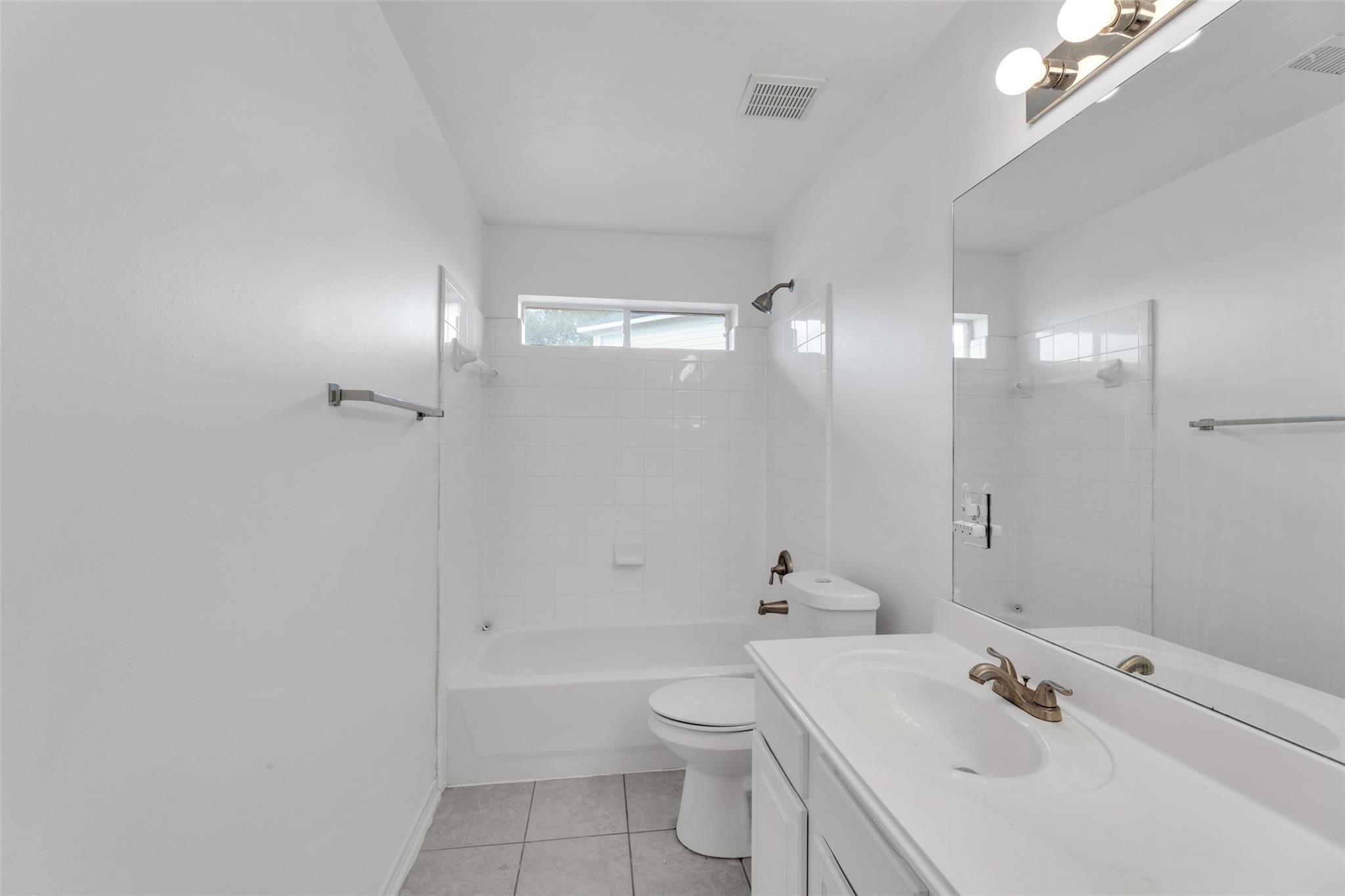 24523 Rathford Court Katy, TX 77494 - Photo 28 of 33 Full secondary bathroom featuring a tub/shower combination for convenience.
