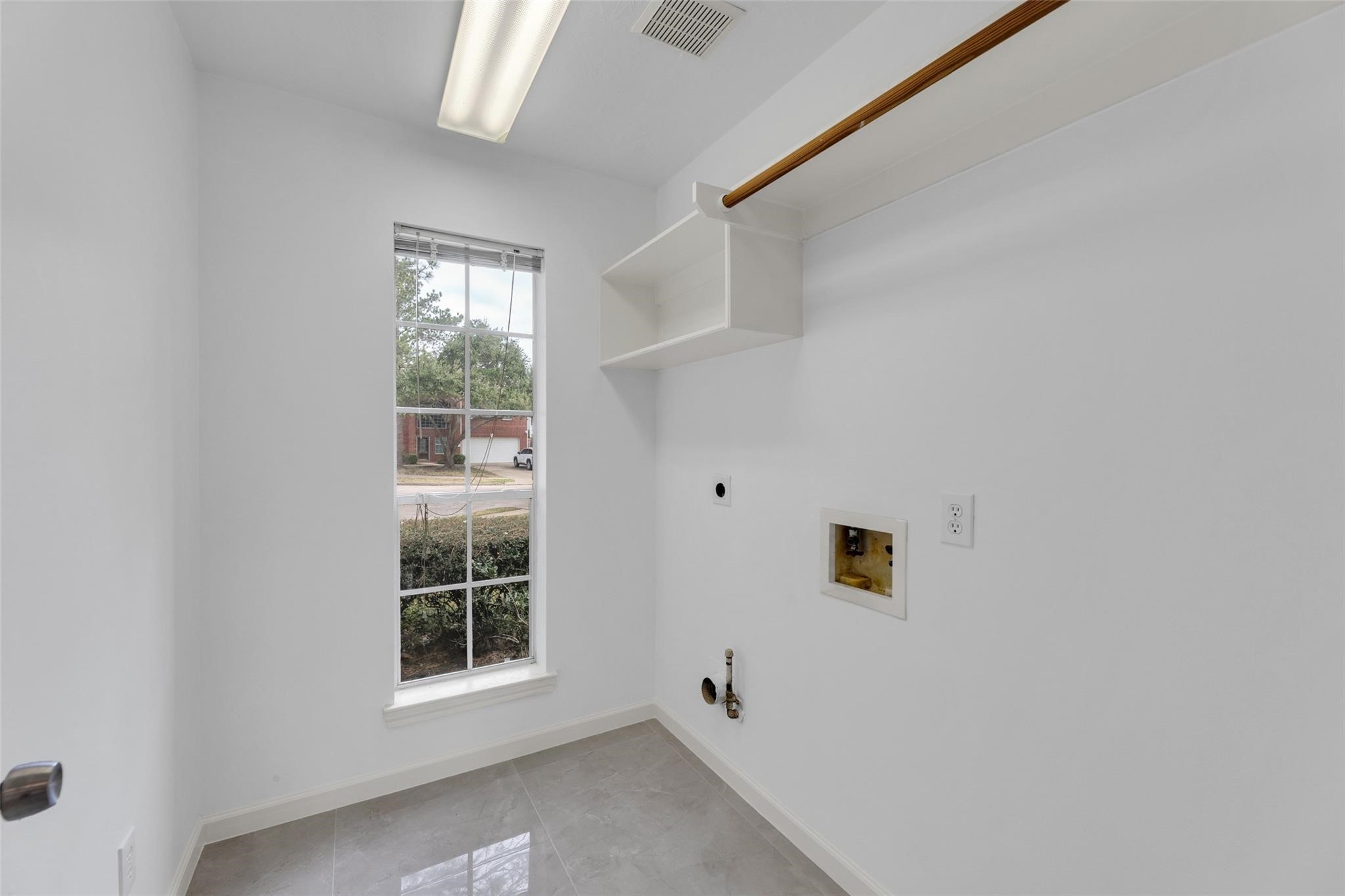 24523 Rathford Court Katy, TX 77494 - Photo 30 of 33 Functional utility room.